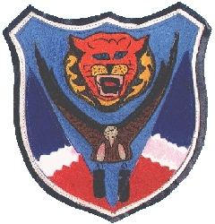 Image of 341st Bomb Group insignia as cloth shoulder patch, in colors of red, white, blue.