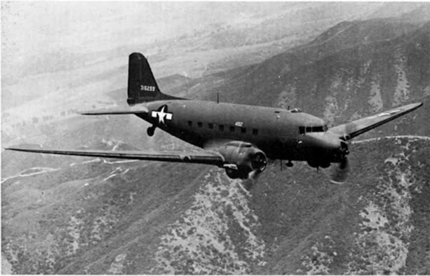 C-46 Command flies over Himalayas